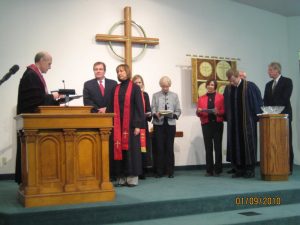 Pastor Ginger receives her charge